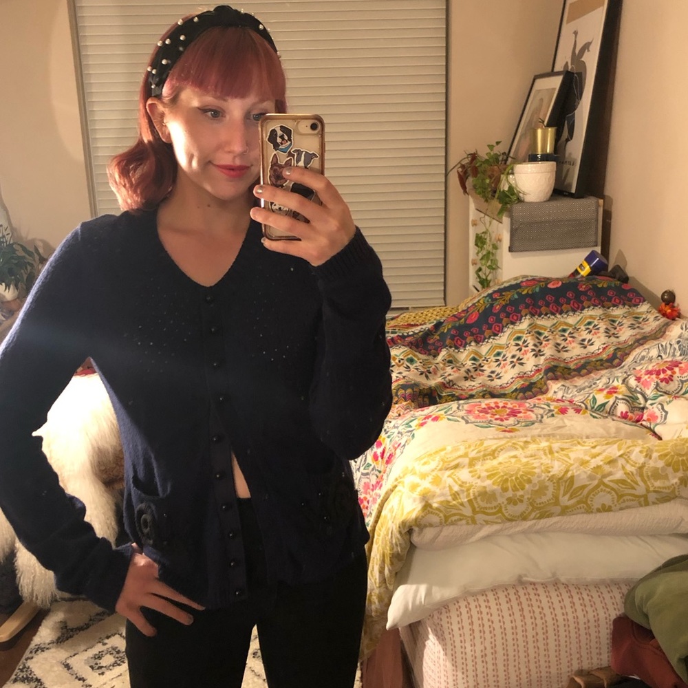 Moth brand navy open stitch button up cardigan with whimsical snail pockets